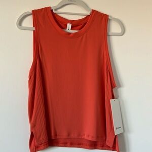 Lululemon train to be tank in orange